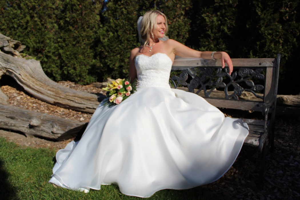 Lovely sweetheart bodice with flattering waistline and luxurious sweep of skirt.
