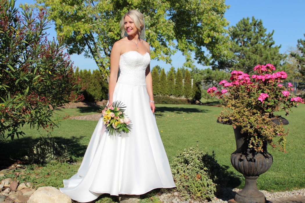 Strapless Ball Gown with lace bodice and organza full circle skirt with satin skirt underlay.