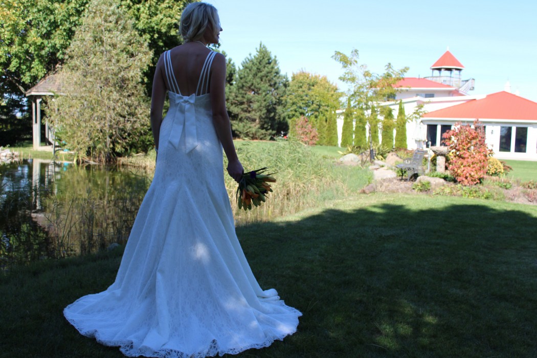 Beautiful low back with triple godet train and lovely bow.