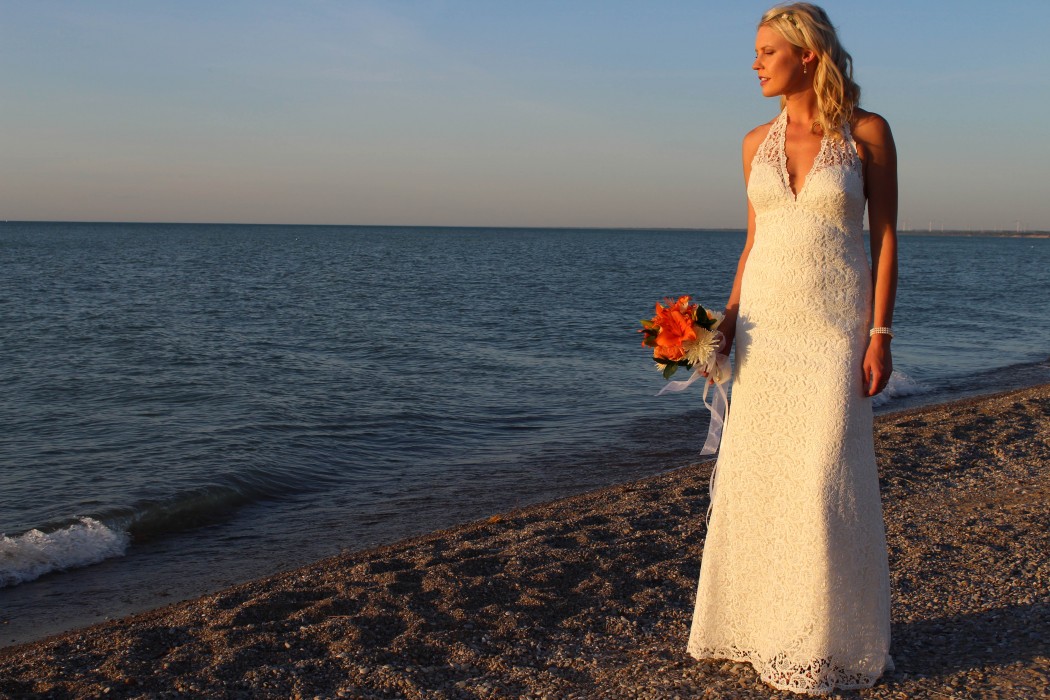 Backless with built in support, empire style line, subtle A-line silhouette and invisible zipper.